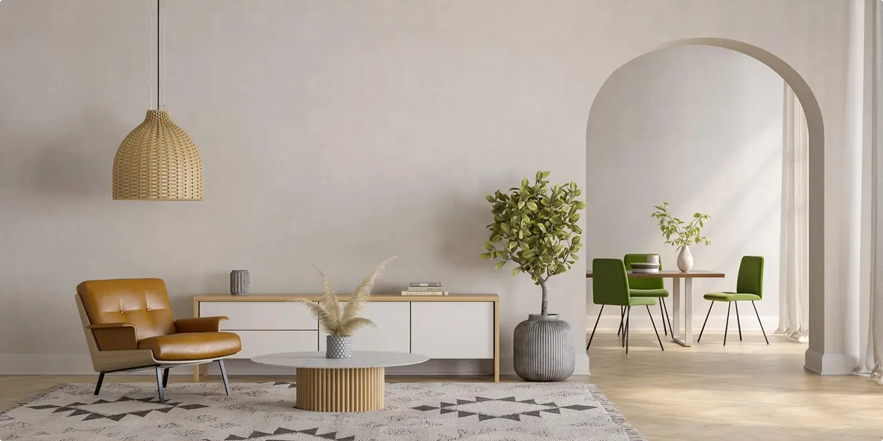 Modern living room with a mustard armchair, wicker pendant light, and geometric rug. A sideboard and plant sit beside an archway leading to a dining area.